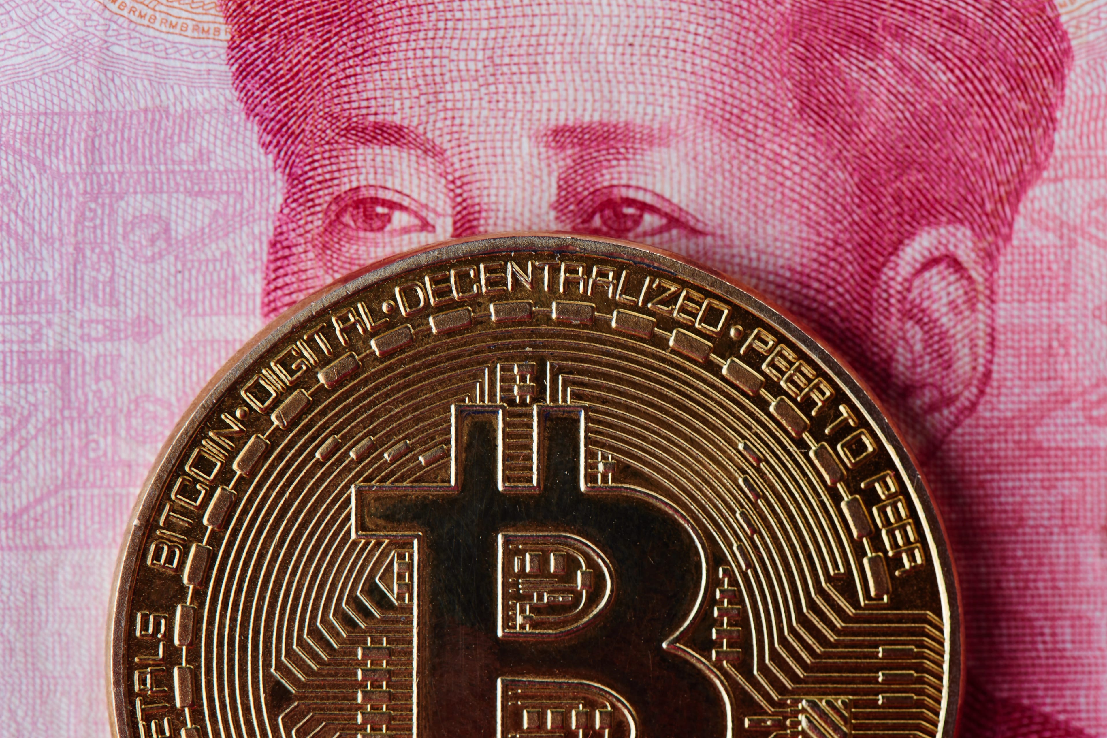 Chinese,Yuan,Money,And,Cryptocurrency,Bitcoin,Close-up.,Digital,Virtual,Internet