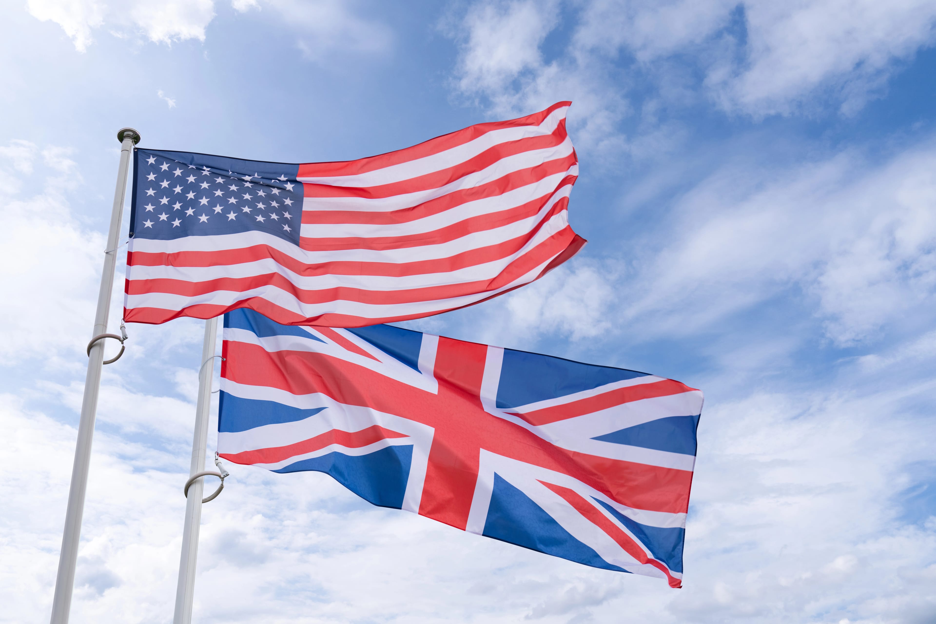 Usa,And,Uk,Flags,Flutter,In,The,Wind